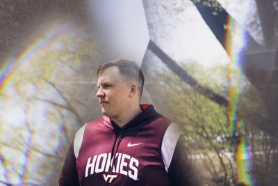 Jeff Parks, a student wearing a Hokies sweatshirt, gazes off into the distance.