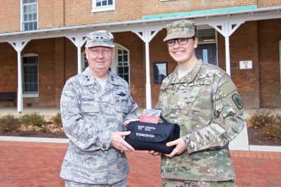 Cadet Jennifer Wells delivered gift to Maj. Gen. Randal Fullhart