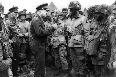 At the Greenham Common Airfield in England, in advance of D-day in 1944, Gen. Dwight D. Eisenhower gives the order “Full victory; nothing less” to members of the 101st Airborne Division. The general also talked about fly fishing with his men, as he always did before a stressful operation.