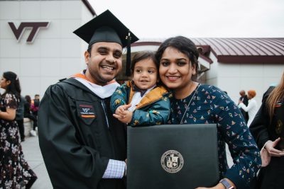 Muneesh Sharma pictured with his family at commencement