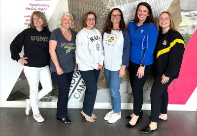 Active duty and veteran spouses employed at the Innovation Campus include (left to right): Marci Hyla, administrative assistant; Candace Hicks, prior employee; Deborah Bradbard, director of the Boeing Center for Veteran Transition and Military Families; Teresa Simmons, human resources assistant; Maura Gardner, human resources division director for the Innovation Campus and D.C. Metro Area; and Lydia Fahey, digital content producer. 